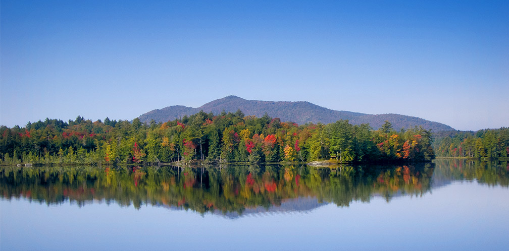 Early fall color on Saint Regis Mountain, from Lower Saint Regis Lake (15 September 2017). Early fall color on Saint Regis Mountain, from Lower Saint Regis Lake (15 September 2017).
